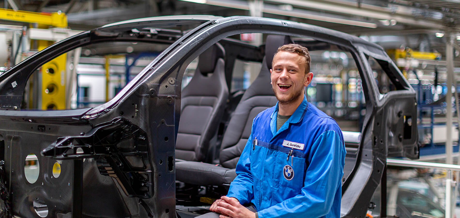 Partner Ein Handballspieler im BMW-Werk